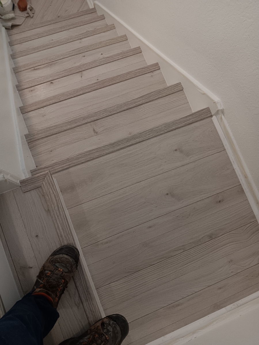 light colored vinyl staircase installation with stair nose, wfa's custom hardwood floors, houston texas